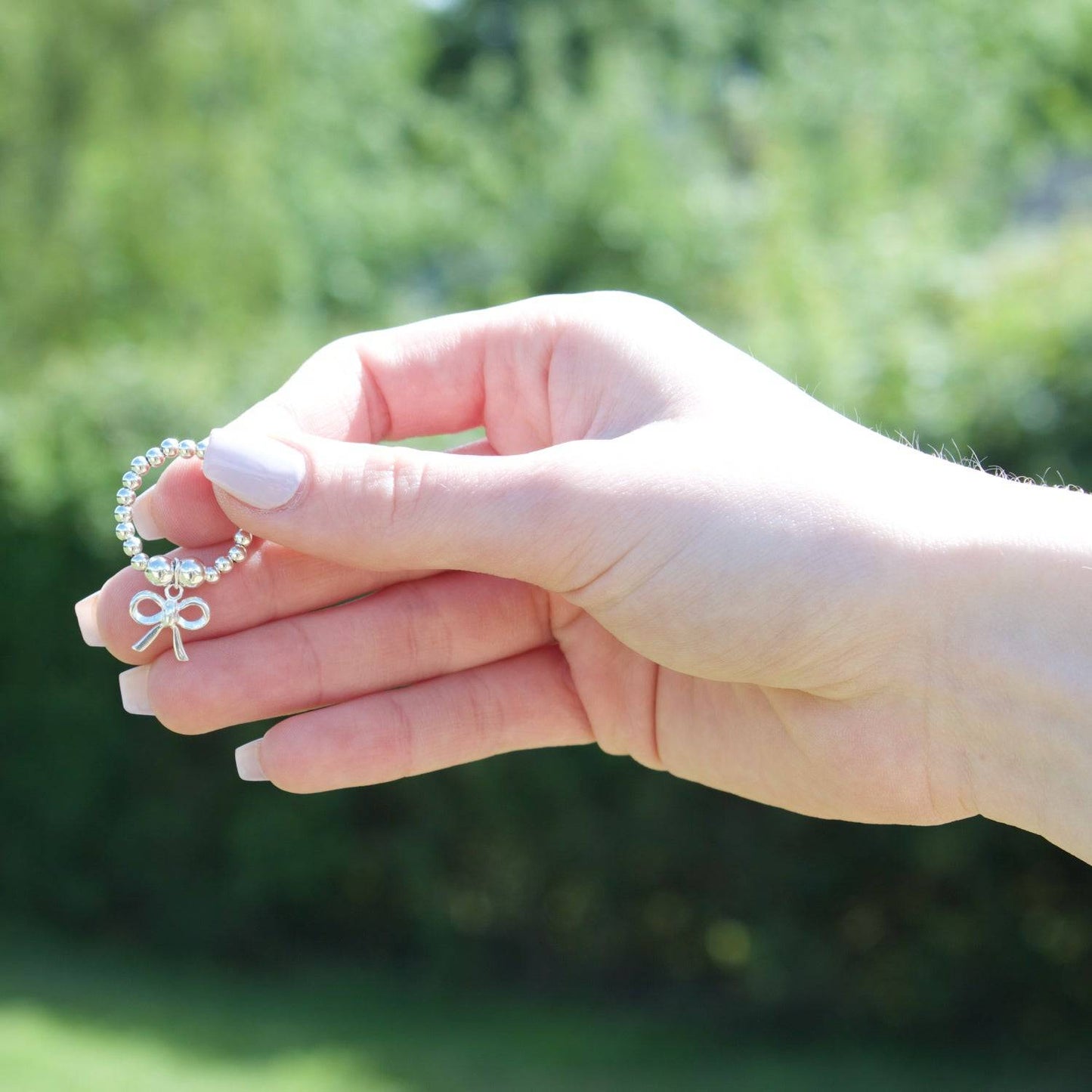 Bow on Silver Ball Bead Ring - MYLEE London