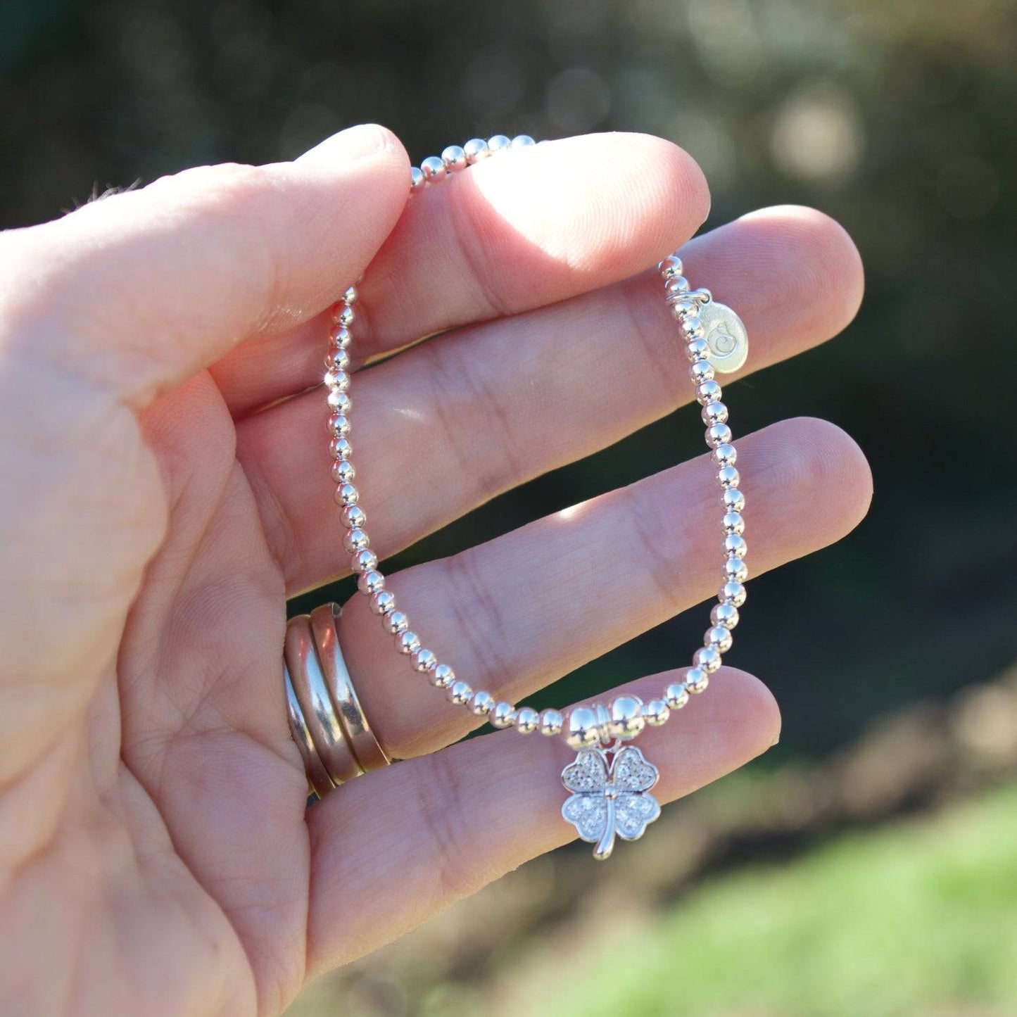 Crystal Four Leaf Clover on Silver Ball Bead Bracelet